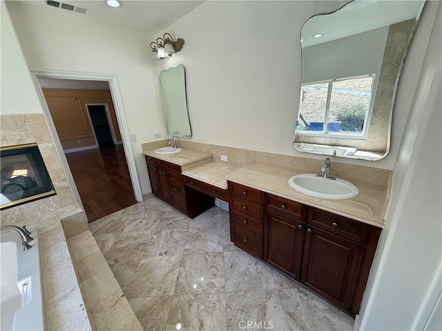 11737 Lois Ct, Granada Hills, CA 91344 - bathroom featuring vanity and a fireplace