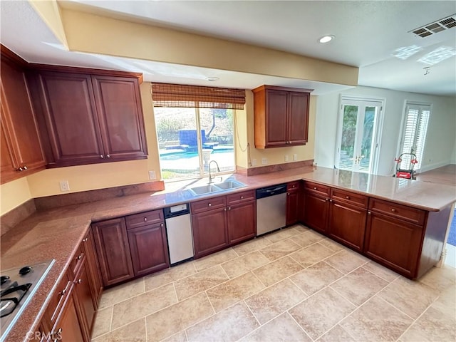 11737 Lois Ct, Granada Hills, CA 91344 - kitchen with appliances with stainless steel finishes, a peninsula, and recessed lighting