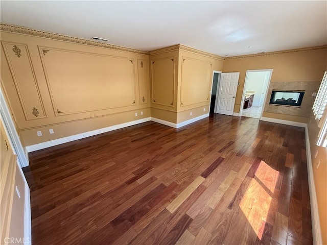 11737 Lois Ct, Granada Hills, CA 91344 - unfurnished living room with wood finished floors, a fireplace, and ornamental molding