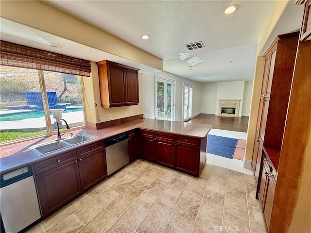 11737 Lois Ct, Granada Hills, CA 91344 - kitchen with dishwasher, dishwashing machine, a peninsula, open floor plan, and recessed lighting