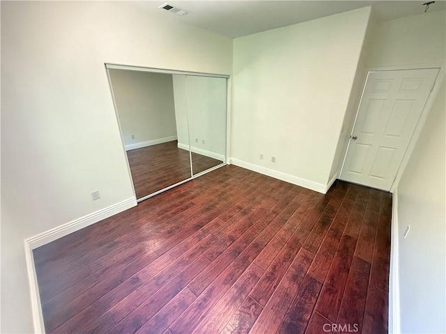 11737 Lois Ct, Granada Hills, CA 91344 - unfurnished bedroom with wood finished floors and a closet
