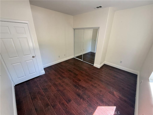 11737 Lois Ct, Granada Hills, CA 91344 - unfurnished bedroom with hardwood / wood-style flooring and a closet