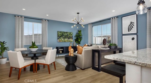 32739 Crystal Cove Ct, Winchester, CA 92596 - dining space with healthy amount of natural light, a chandelier, light wood-type flooring, and recessed lighting