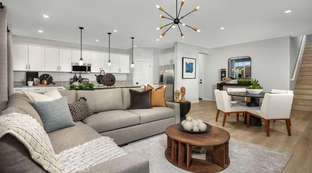 32739 Crystal Cove Ct, Winchester, CA 92596 - living room featuring light wood-style flooring, recessed lighting, and a chandelier