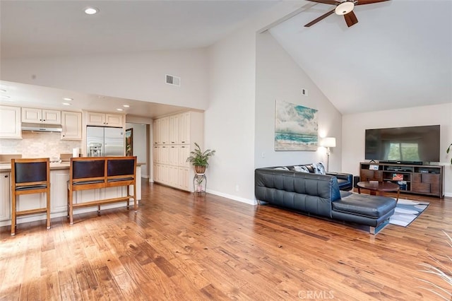 2580 Crown Way, Fullerton, CA 92833 - living area featuring high vaulted ceiling, light wood-style floors, ceiling fan, and recessed lighting