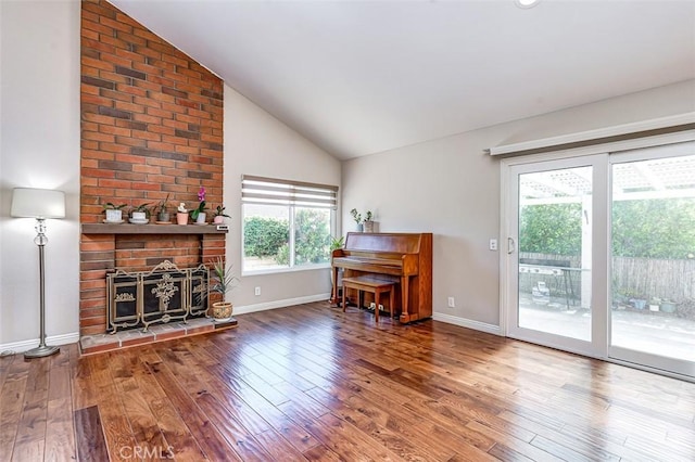2580 Crown Way, Fullerton, CA 92833 - living room with hardwood / wood-style flooring and vaulted ceiling
