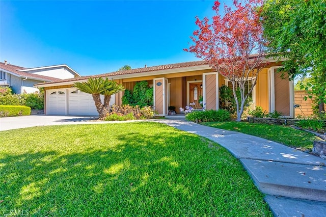 2580 Crown Way, Fullerton, CA 92833 - ranch-style home featuring a front lawn, concrete driveway, an attached garage, and a tiled roof