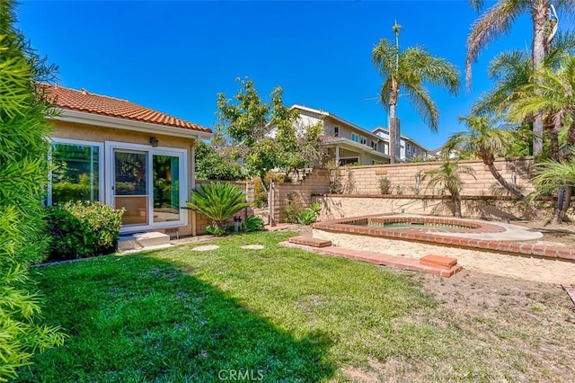 2580 Crown Way, Fullerton, CA 92833 - view of yard with an in-ground hot tub