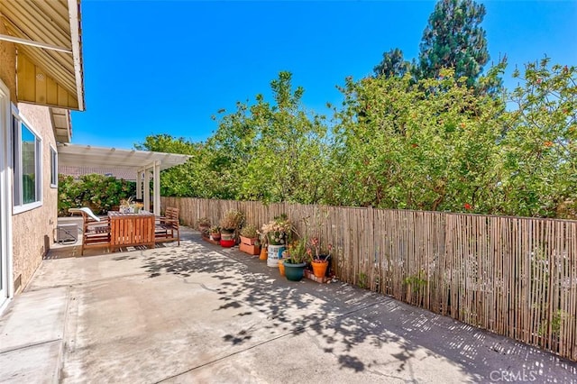 2580 Crown Way, Fullerton, CA 92833 - fenced backyard featuring a patio area and outdoor dining area