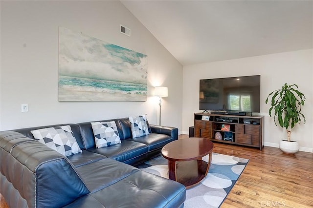 2580 Crown Way, Fullerton, CA 92833 - living area with vaulted ceiling and wood finished floors