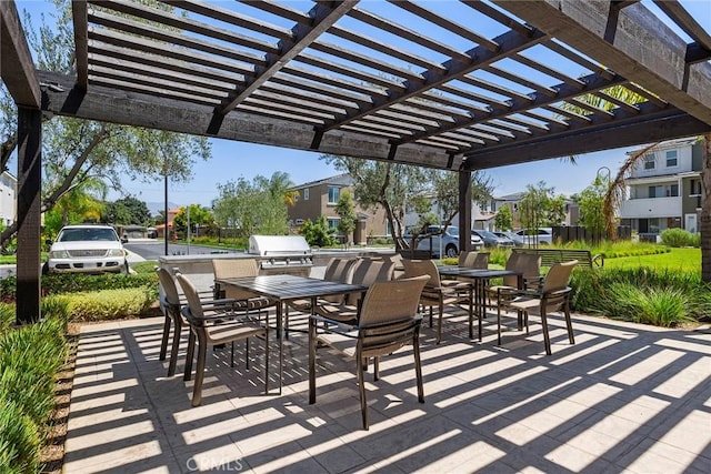 247 Lockhart Way, West Covina, CA 91790 - view of patio / terrace with outdoor dining area, a pergola, an outdoor kitchen, and a residential view