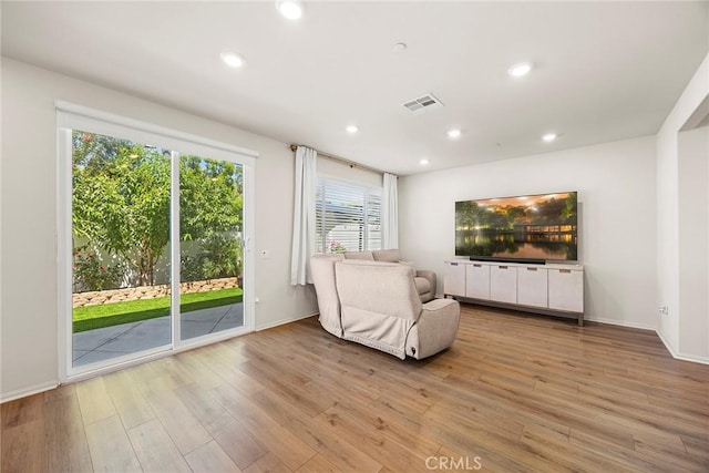 247 Lockhart Way, West Covina, CA 91790 - sitting room with light wood-style floors and recessed lighting