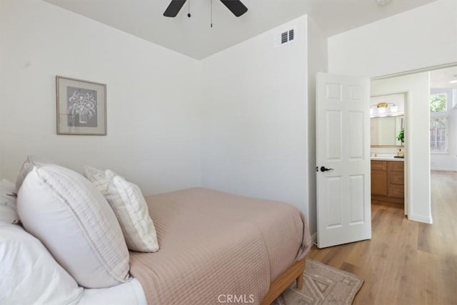 14080 Crestline Pl, Rancho Cucamonga, CA 91739 - bedroom with light wood-style floors and a ceiling fan