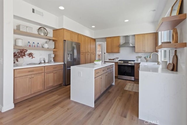 14080 Crestline Pl, Rancho Cucamonga, CA 91739 - kitchen with appliances with stainless steel finishes, wall chimney range hood, open shelves, light wood-style floors, and a center island