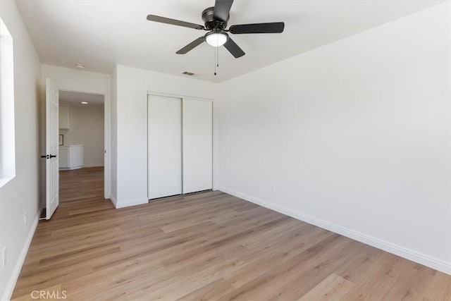 14080 Crestline Pl, Rancho Cucamonga, CA 91739 - unfurnished bedroom with light wood-style floors, a closet, and a ceiling fan
