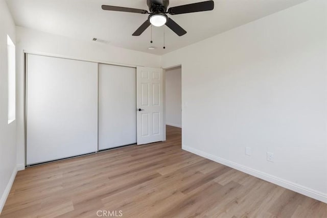 14080 Crestline Pl, Rancho Cucamonga, CA 91739 - unfurnished bedroom featuring wood finished floors, a closet, and a ceiling fan