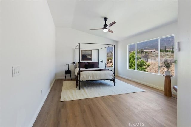14080 Crestline Pl, Rancho Cucamonga, CA 91739 - bedroom featuring wood finished floors, lofted ceiling, and ceiling fan