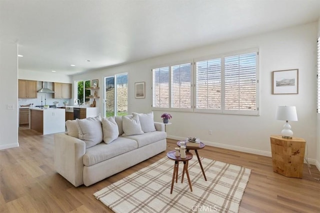 14080 Crestline Pl, Rancho Cucamonga, CA 91739 - living room with light wood-style flooring and recessed lighting