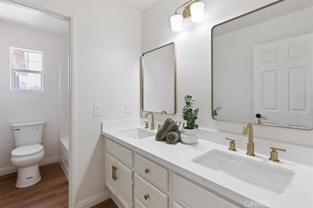 14080 Crestline Pl, Rancho Cucamonga, CA 91739 - bathroom with double vanity, wood finished floors, and bathtub / shower combination