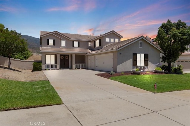 14080 Crestline Pl, Rancho Cucamonga, CA 91739 - traditional-style home featuring concrete driveway, stucco siding, a garage, a front yard, and a tiled roof