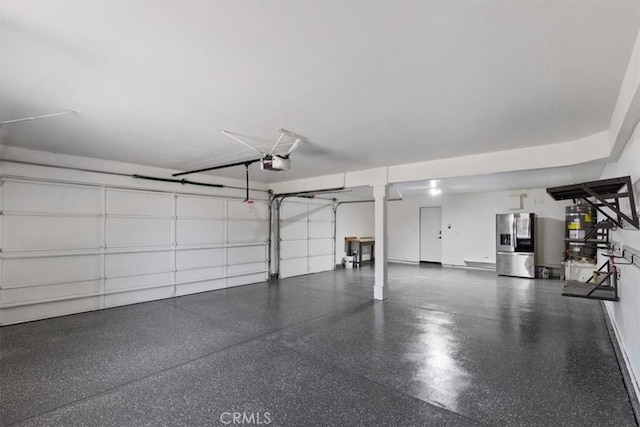 14080 Crestline Pl, Rancho Cucamonga, CA 91739 - garage featuring stainless steel refrigerator with ice dispenser and a garage door opener