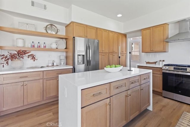 14080 Crestline Pl, Rancho Cucamonga, CA 91739 - kitchen featuring stainless steel appliances, wall chimney exhaust hood, light countertops, light wood-style flooring, and open shelves