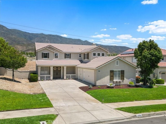 14080 Crestline Pl, Rancho Cucamonga, CA 91739 - traditional home featuring a mountain view, a tiled roof, concrete driveway, and a porch
