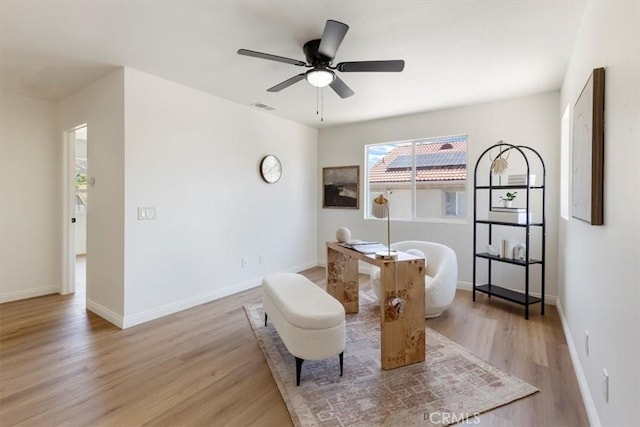 14080 Crestline Pl, Rancho Cucamonga, CA 91739 - living area with light wood-style floors and ceiling fan