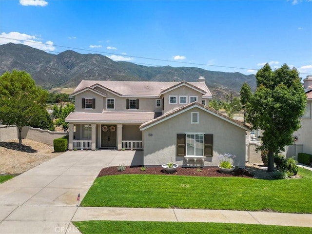 14080 Crestline Pl, Rancho Cucamonga, CA 91739 - traditional-style house featuring a mountain view, covered porch, driveway, stucco siding, and a tiled roof