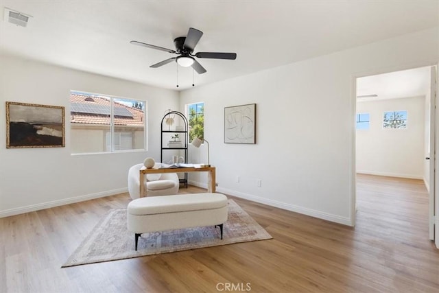 14080 Crestline Pl, Rancho Cucamonga, CA 91739 - living area with wood finished floors and ceiling fan