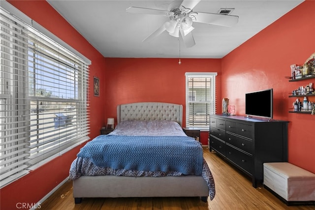 2184 S Towne Ave, Pomona, CA 91766 - bedroom featuring wood finished floors and a ceiling fan