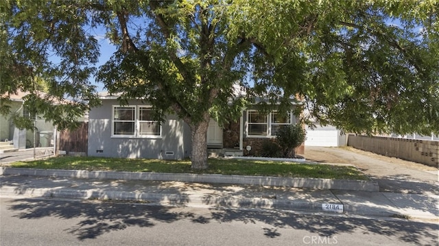 2184 S Towne Ave, Pomona, CA 91766 - obstructed view of property with concrete driveway and an attached garage
