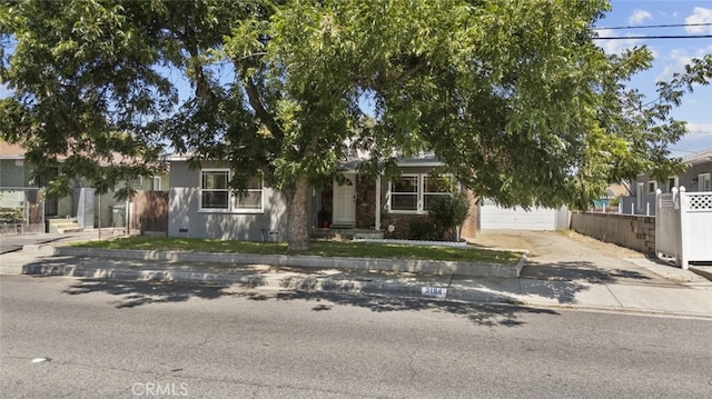 2184 S Towne Ave, Pomona, CA 91766 - view of property hidden behind natural elements featuring concrete driveway and crawl space
