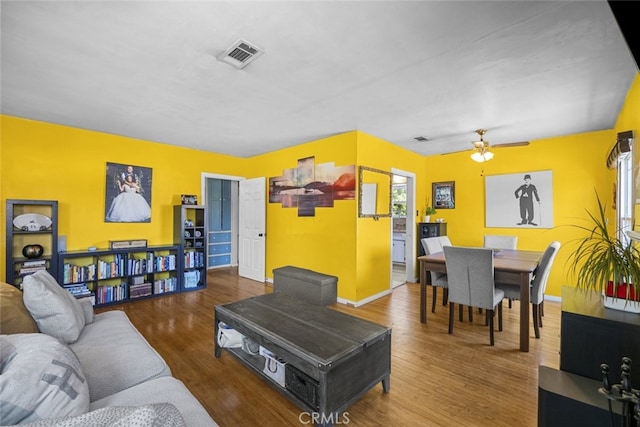 2184 S Towne Ave, Pomona, CA 91766 - living room with wood finished floors and a ceiling fan