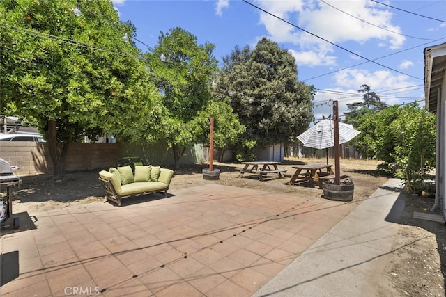 2184 S Towne Ave, Pomona, CA 91766 - fenced backyard with a patio area and outdoor lounge area