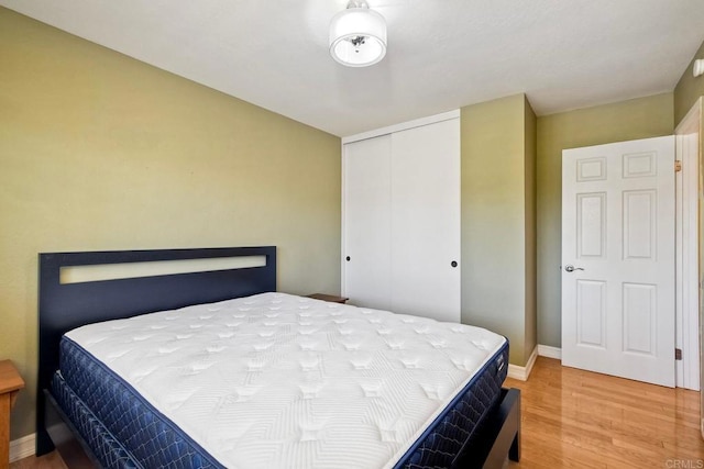 635 Boysenberry Way, Oceanside, CA 92057 - bedroom featuring light wood finished floors and a closet