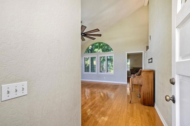 635 Boysenberry Way, Oceanside, CA 92057 - hall featuring light wood-style flooring, a textured wall, and a high ceiling