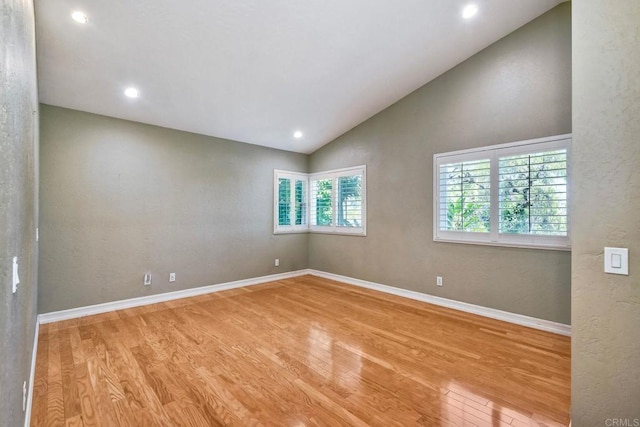 635 Boysenberry Way, Oceanside, CA 92057 - unfurnished room featuring wood finished floors, vaulted ceiling, and recessed lighting