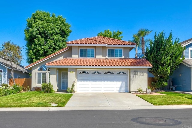 635 Boysenberry Way, Oceanside, CA 92057 - mediterranean / spanish-style house with stucco siding, driveway, and a tile roof