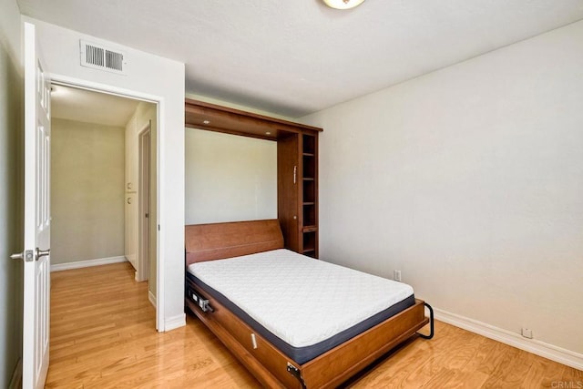635 Boysenberry Way, Oceanside, CA 92057 - bedroom with baseboards and light wood-style flooring