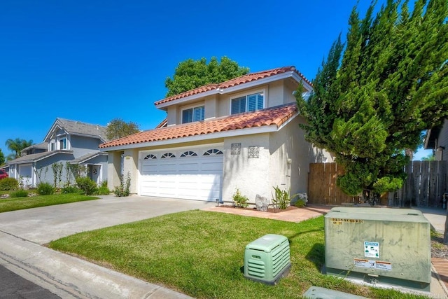 635 Boysenberry Way, Oceanside, CA 92057 - mediterranean / spanish-style house with stucco siding, a tiled roof, and driveway