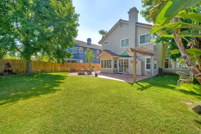 635 Boysenberry Way, Oceanside, CA 92057 - back of house with stucco siding, a patio, a pergola, a fenced backyard, and a chimney