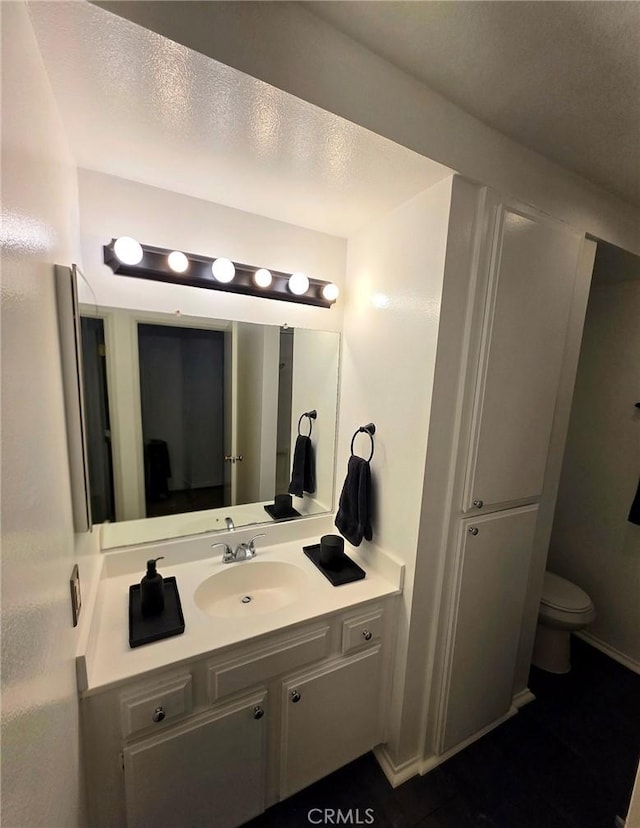 6815 Remmet Ave Unit 217, Canoga Park, CA 91303 - bathroom with vanity and toilet