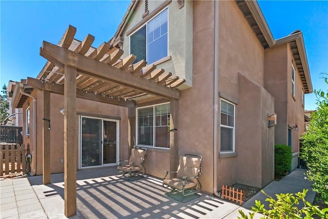 9180 Araujo Ct, Atascadero, CA 93422 - back of house featuring a patio area, a pergola, and stucco siding