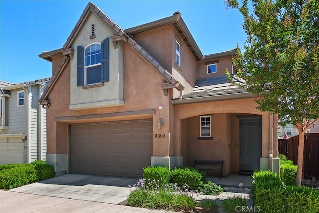9180 Araujo Ct, Atascadero, CA 93422 - view of front of house with a garage, stucco siding, and concrete driveway