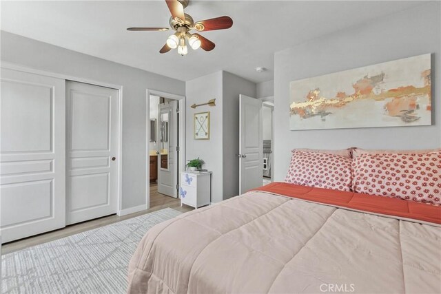 9180 Araujo Ct, Atascadero, CA 93422 - bedroom with wood finished floors, a closet, ensuite bath, and ceiling fan