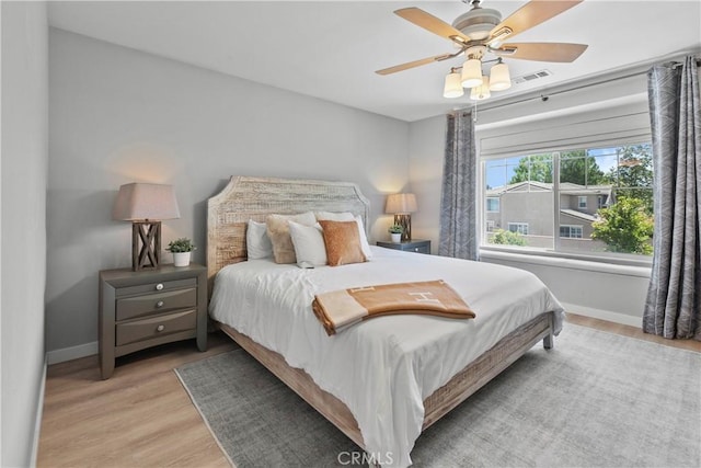 9180 Araujo Ct, Atascadero, CA 93422 - bedroom featuring wood finished floors and a ceiling fan