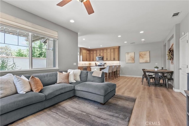 9180 Araujo Ct, Atascadero, CA 93422 - living room featuring light wood-style floors, recessed lighting, and a ceiling fan