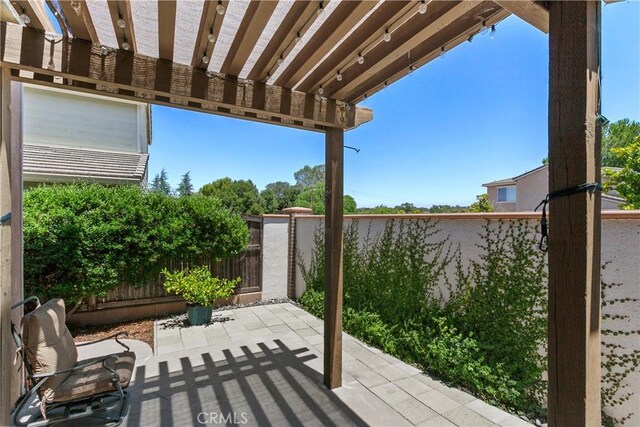 9180 Araujo Ct, Atascadero, CA 93422 - fenced backyard featuring a patio area and a pergola