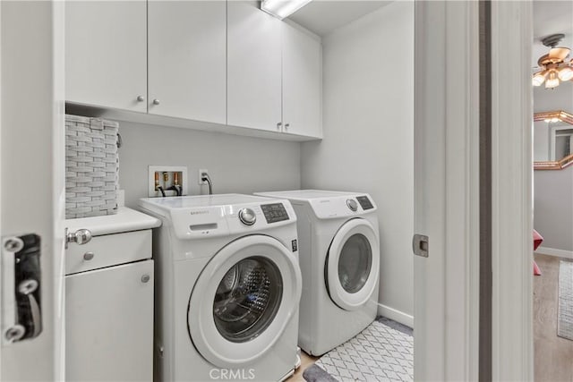 9180 Araujo Ct, Atascadero, CA 93422 - laundry room with cabinet space and washing machine and dryer
